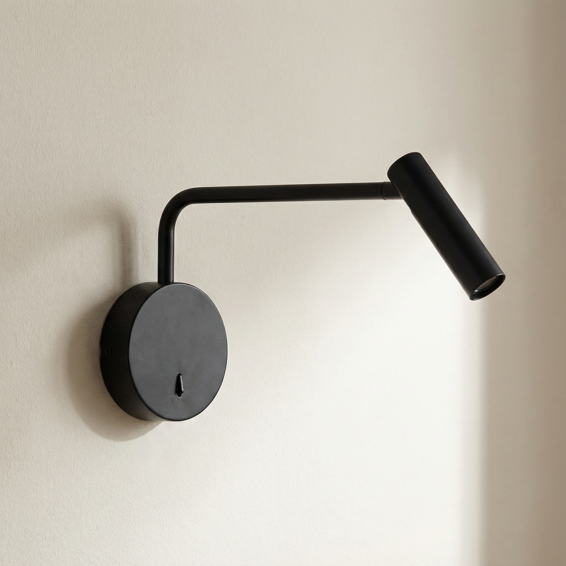 Minimalist Wall Sconce With Adjustable Arm